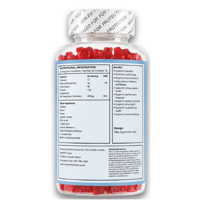 Bottle of red gummy bears with a label on a white background