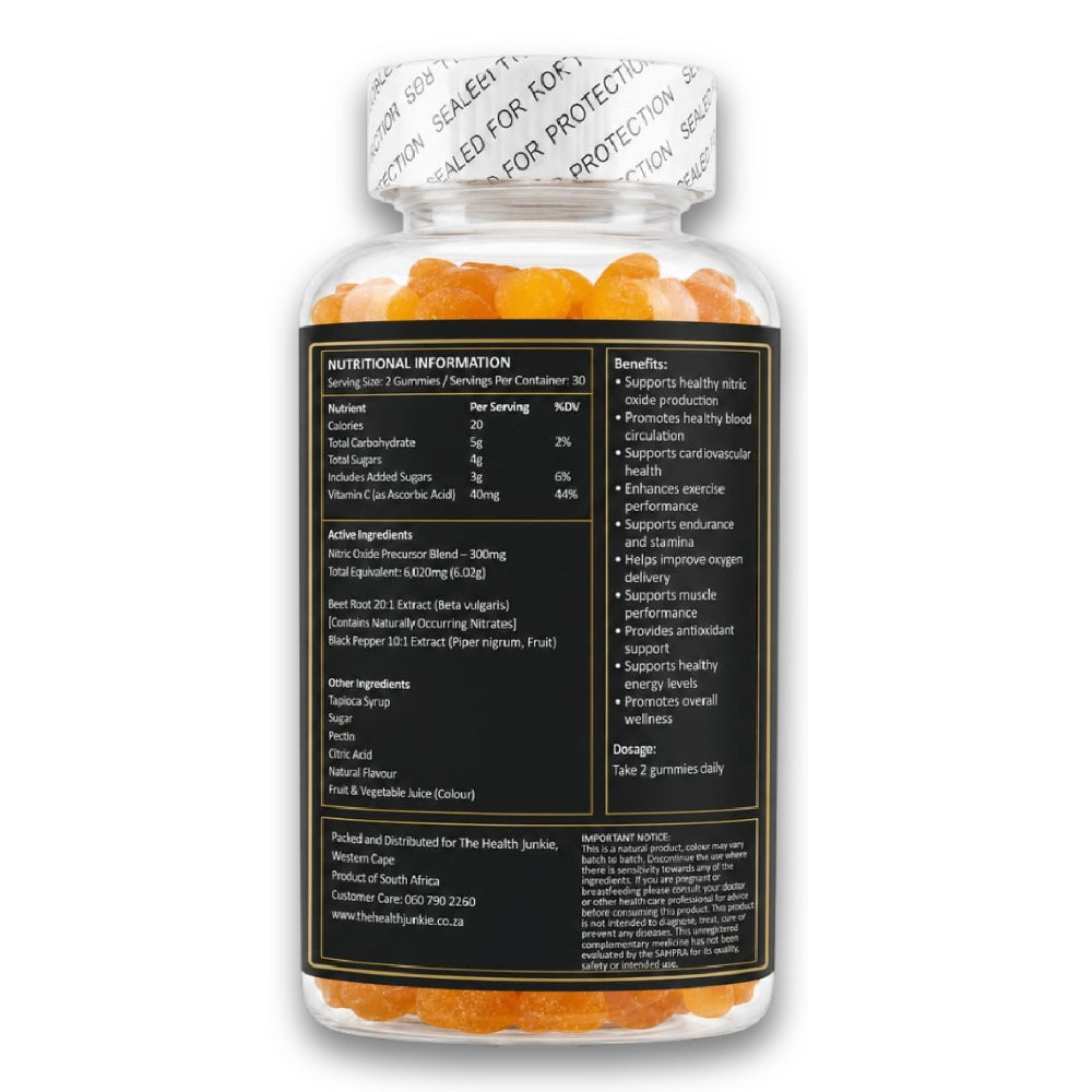 Supplement bottle with orange capsules and nutritional information label on a white background
